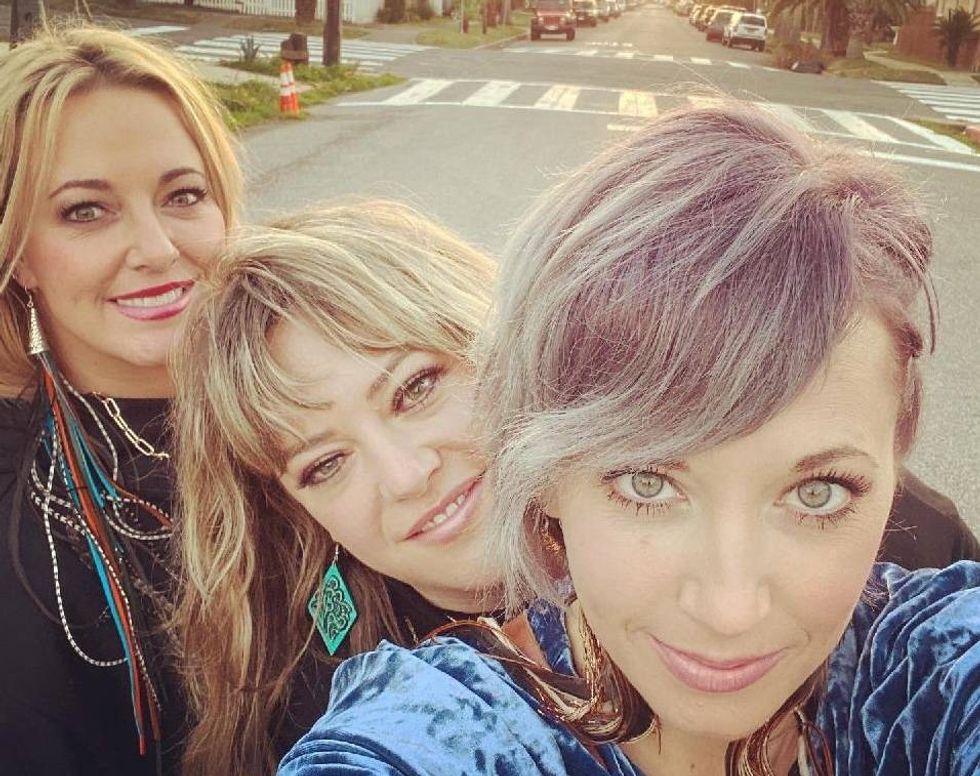 Robin, with her sisters