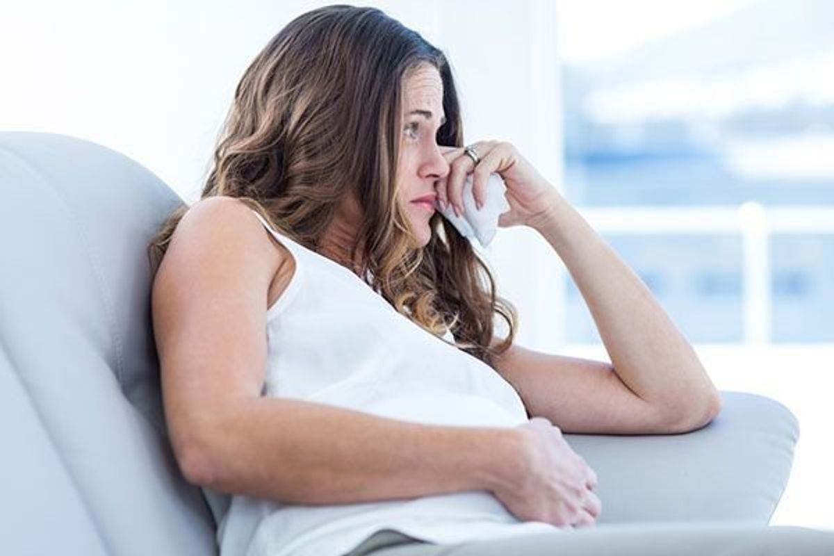 sad pregnant woman