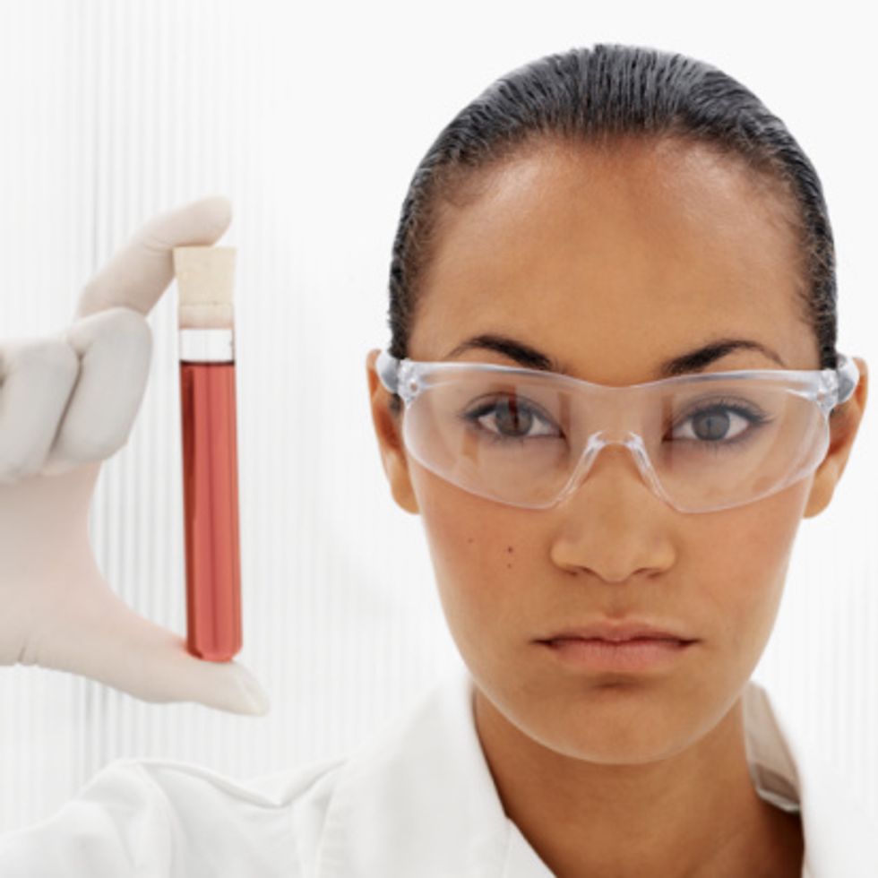 scientist holding a beaker