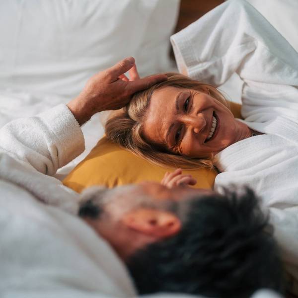 Senior couple sharing an intimate moment in bed