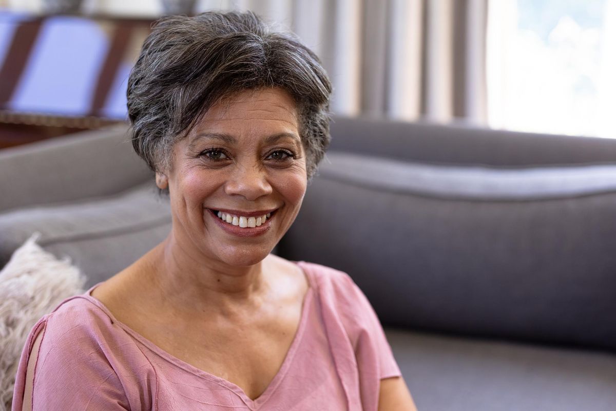 Senior woman sitting on a couch