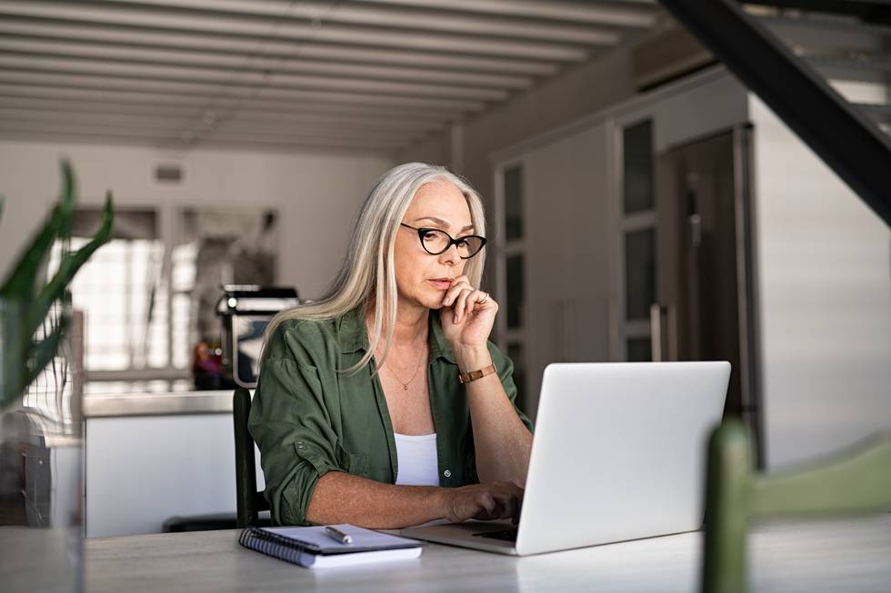 senior woman using laptop