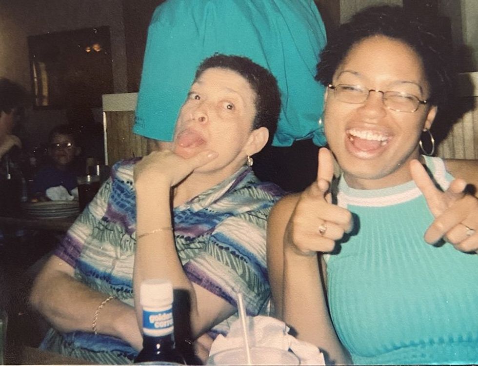 Sh\u00e9 and her mom at a family dinner in 2003.