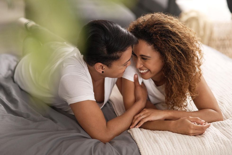 Shot of a couple sharing a intimate moment in bed