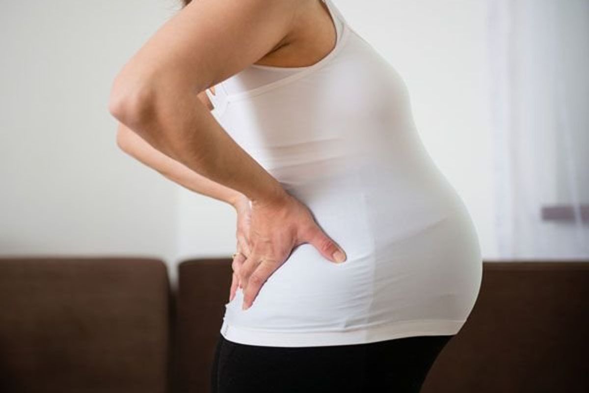 side profile of a pregnant woman