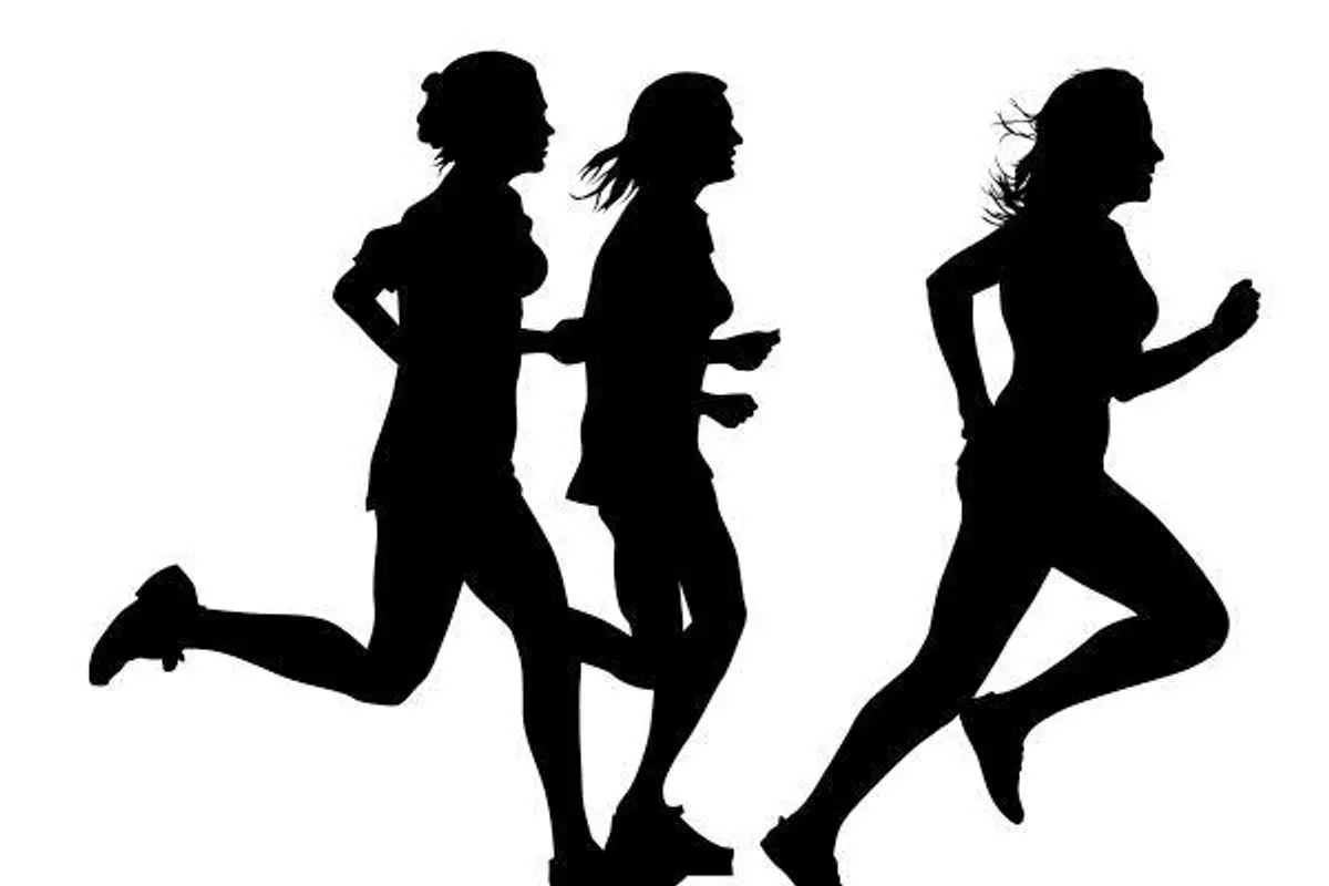 silhouette of runners