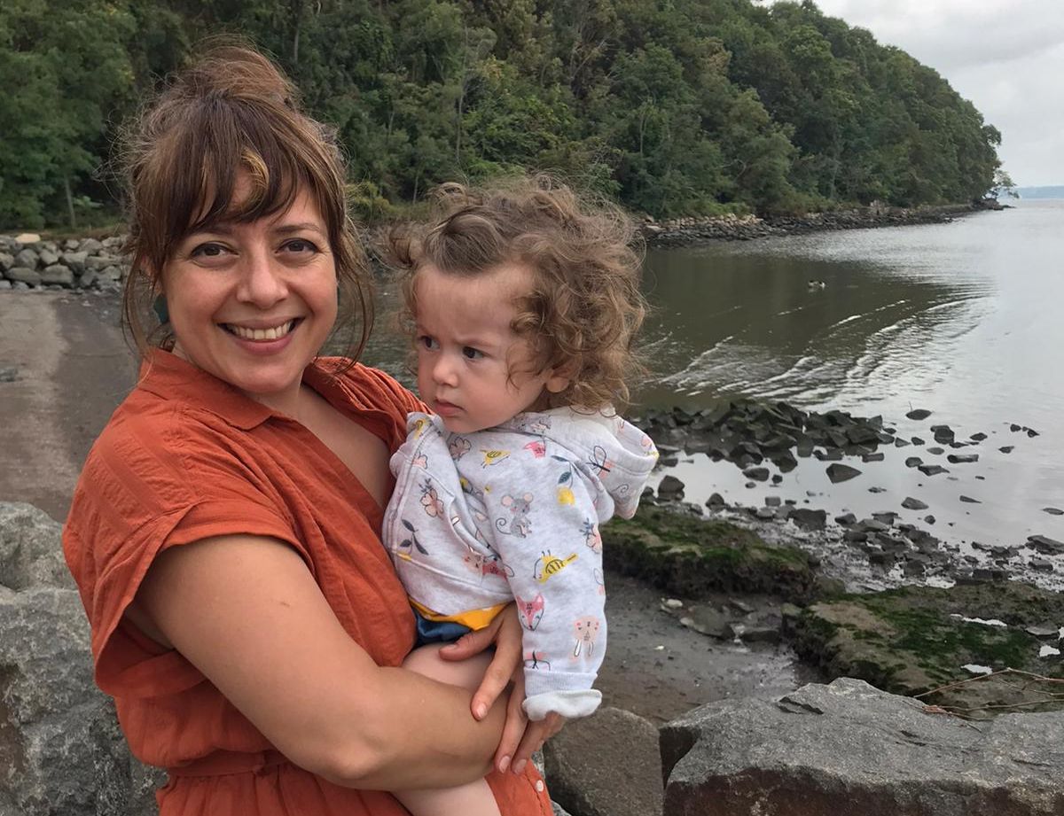 Sima and her child outdoors