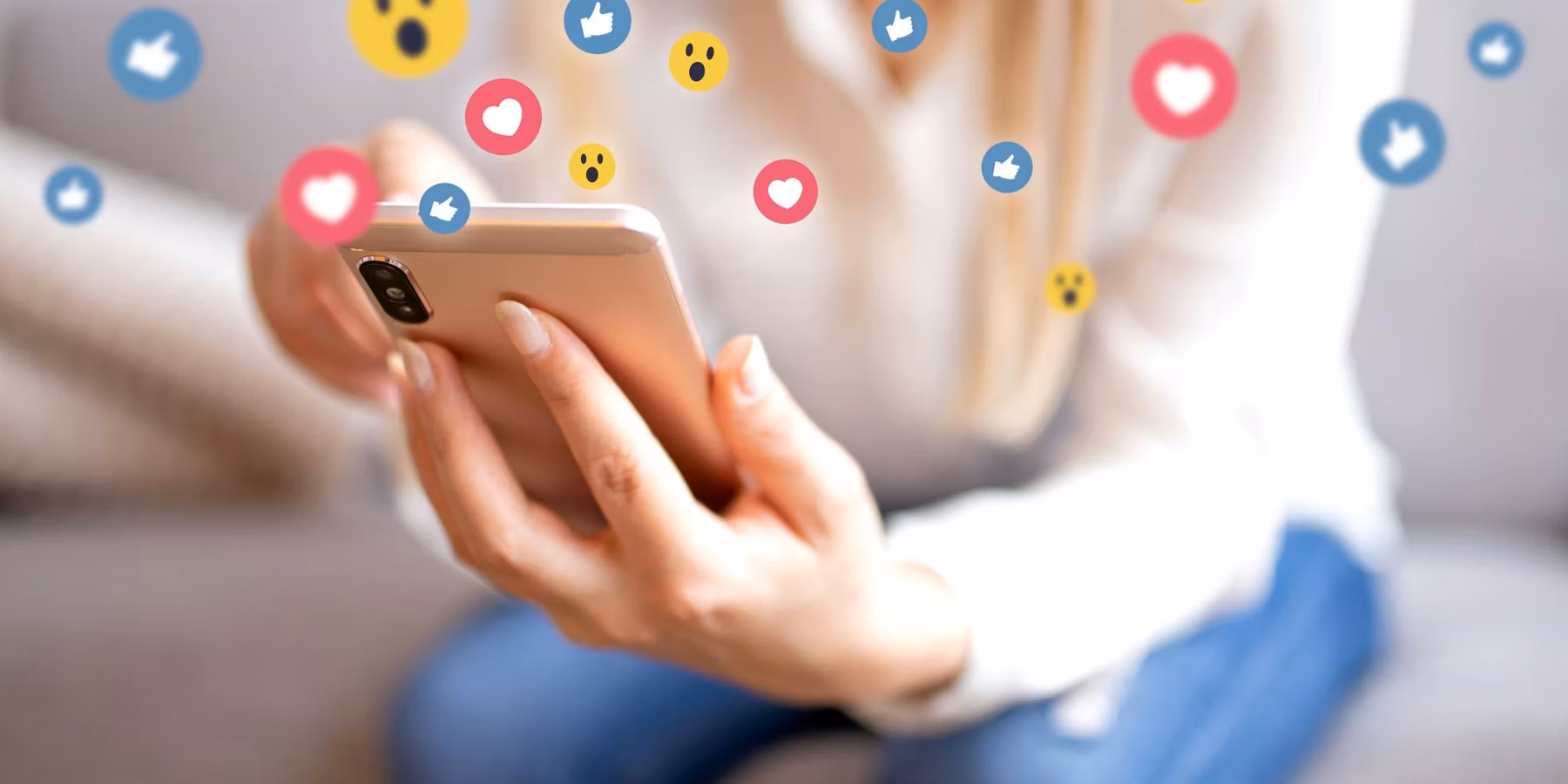 Smiling young woman with mobile phone Surfing the internet