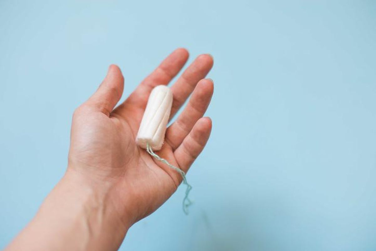 tampon in woman hand