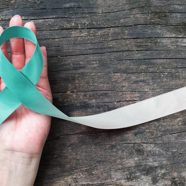 Teal and white ribbon for Cervical Cancer awareness