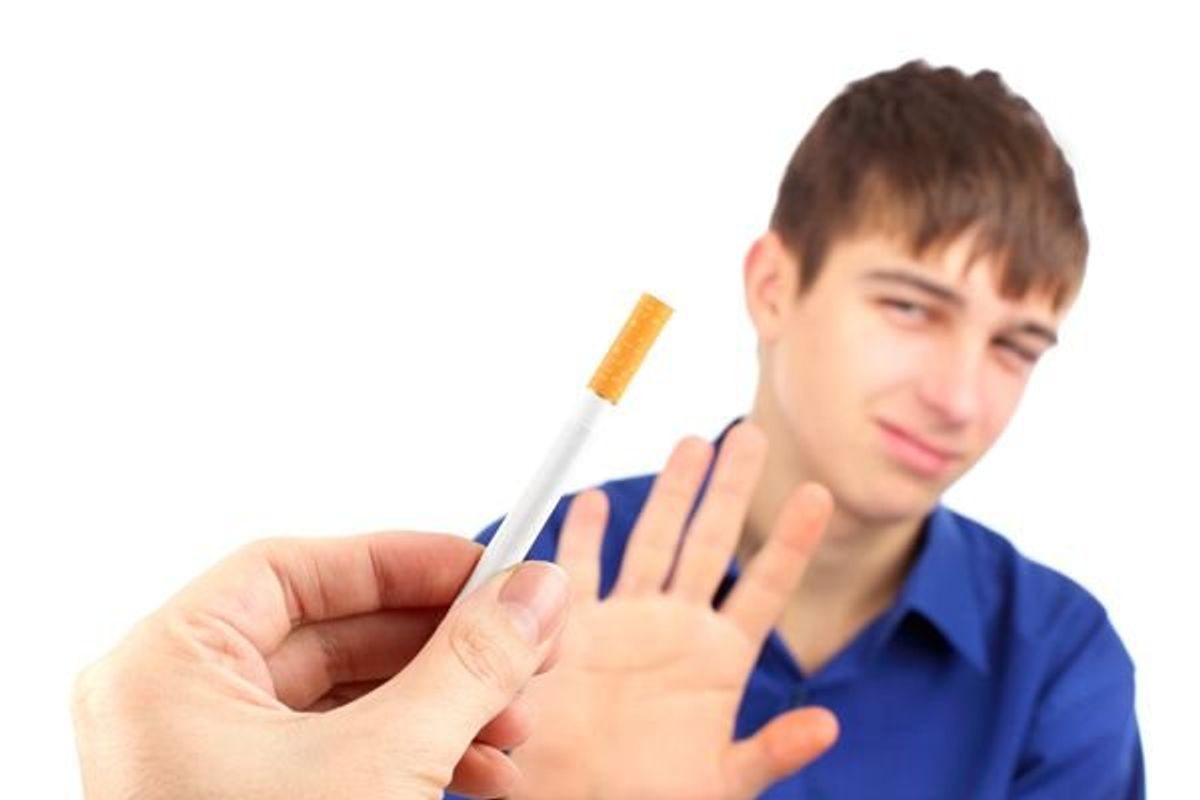 teen saying no to a cigarette