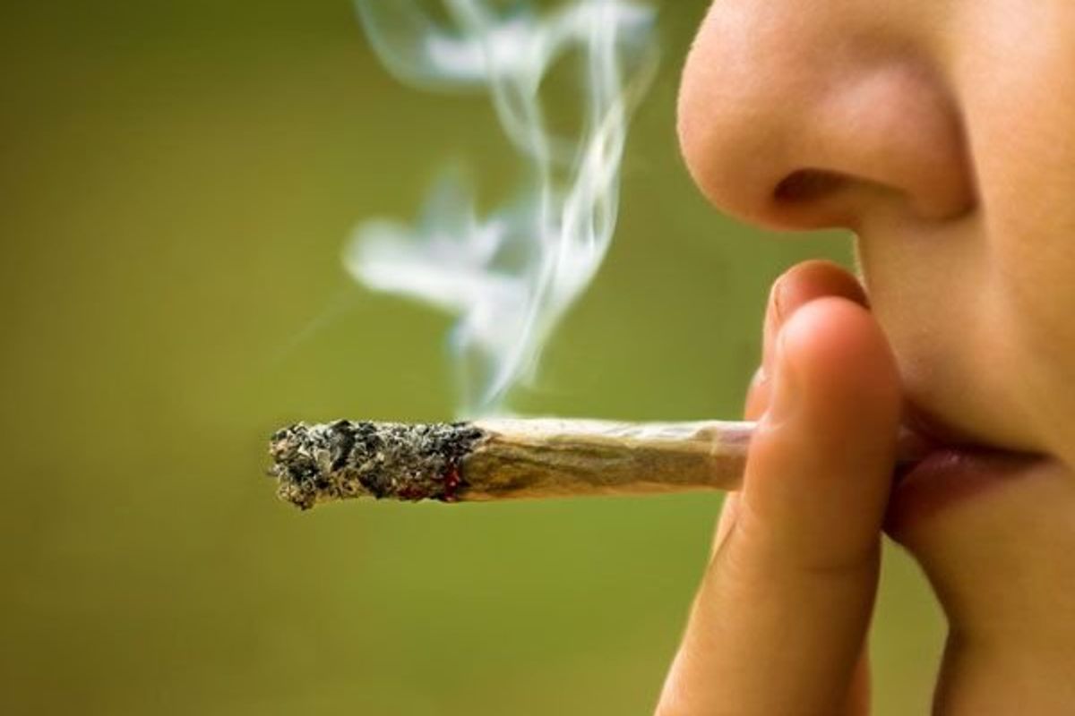 teen smoking marijuana