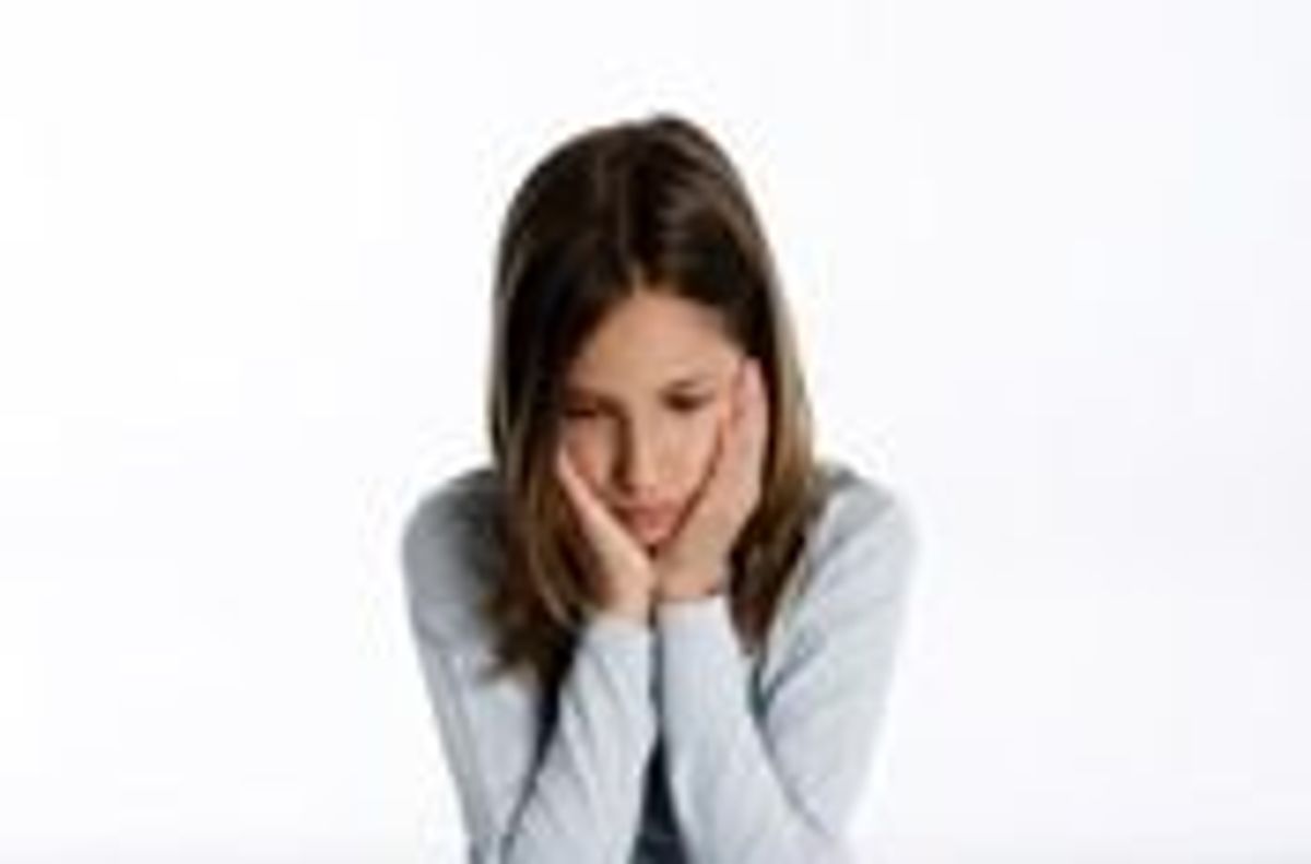 teenage girl being cyberbullied