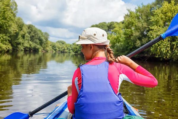 teenager kayaking