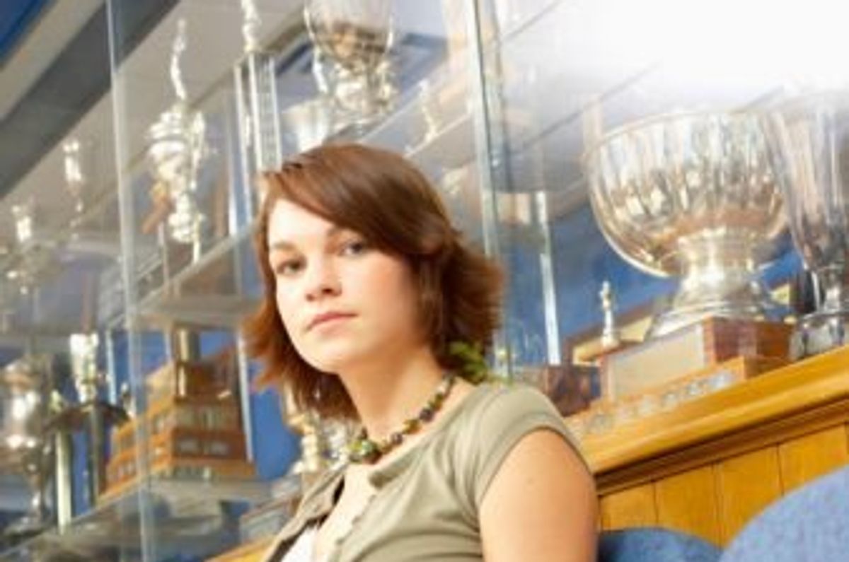 teenager sitting on a couch