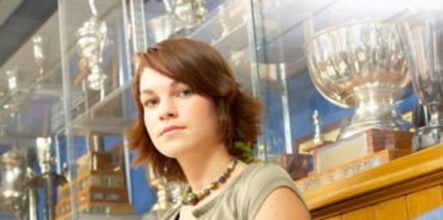 teenager sitting on a couch