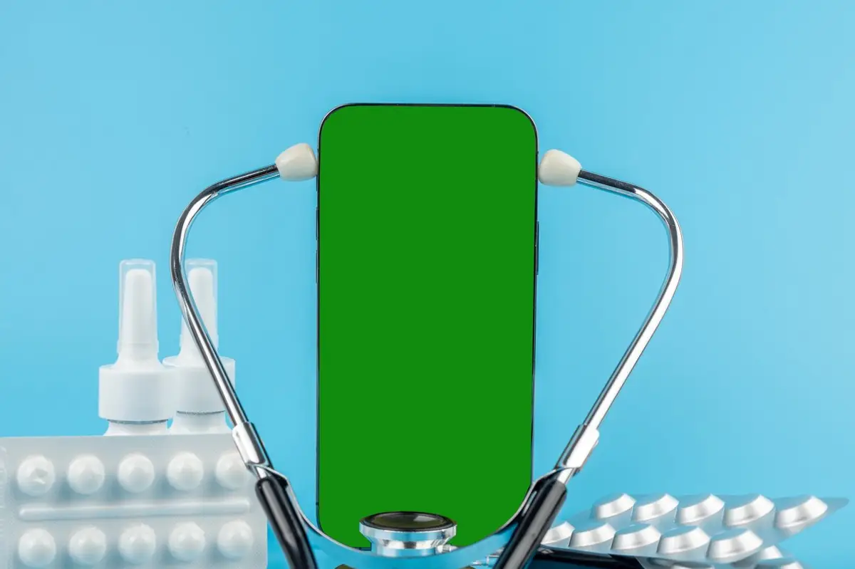 Telemedicine concept, medicine online internet pharmacy. Smartphone, medicines and stethoscope.