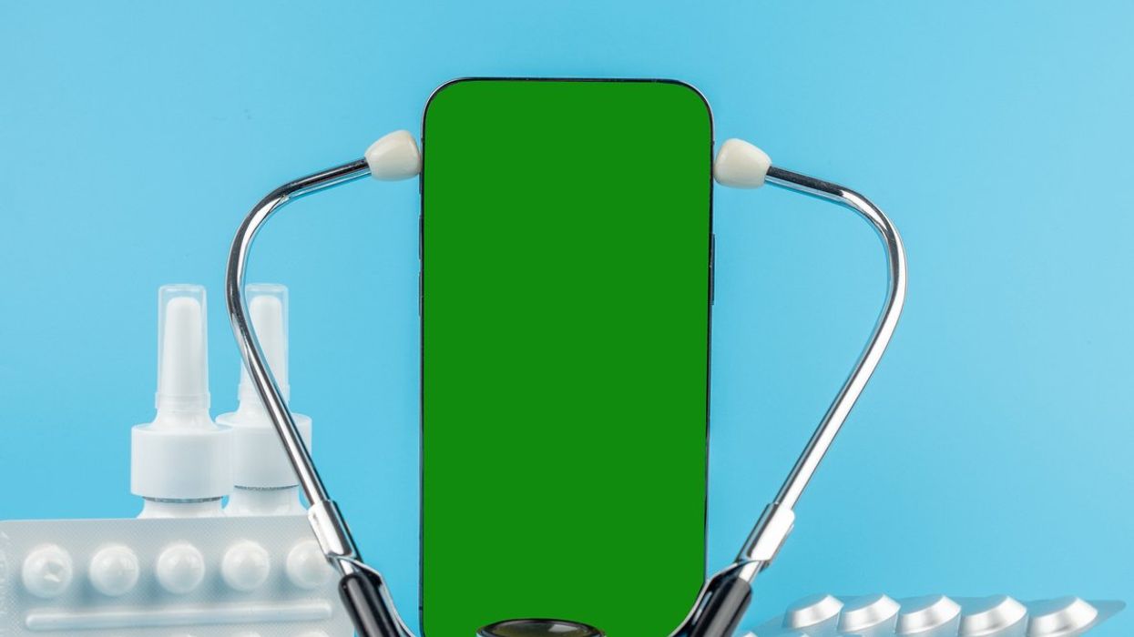 Telemedicine concept, medicine online internet pharmacy. Smartphone, medicines and stethoscope.