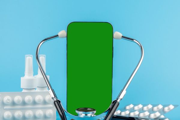 Telemedicine concept, medicine online internet pharmacy. Smartphone, medicines and stethoscope.