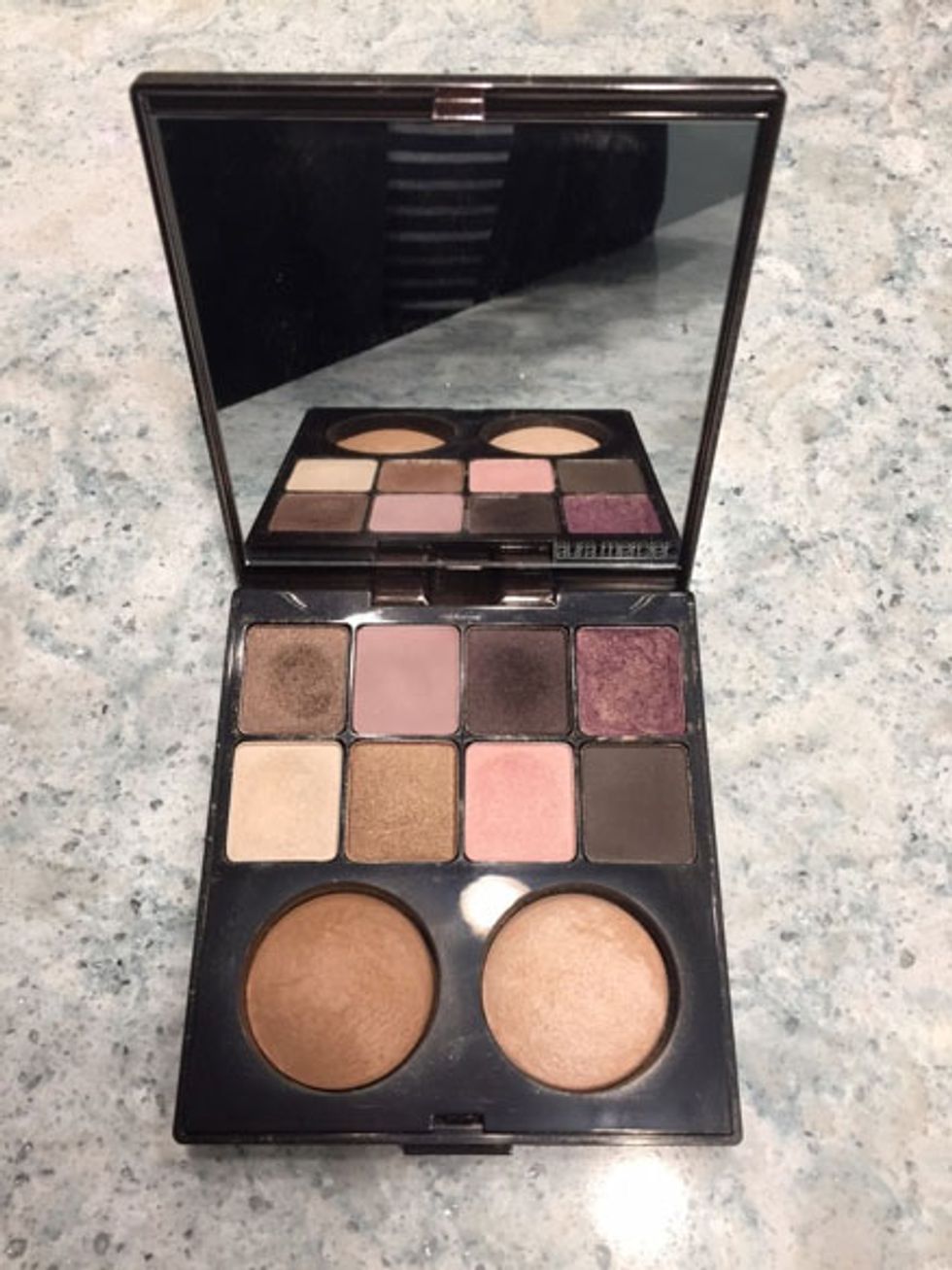 The Laura Mercier color palette comes with eyeshadows, bronzer and highlighter.