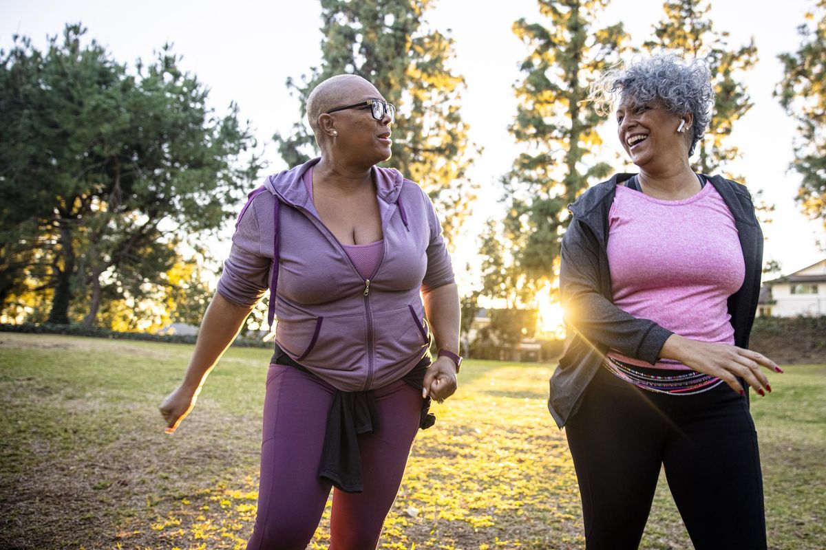 Two black woman walking