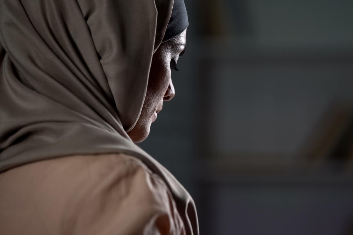 Unhappy arab woman in hijab