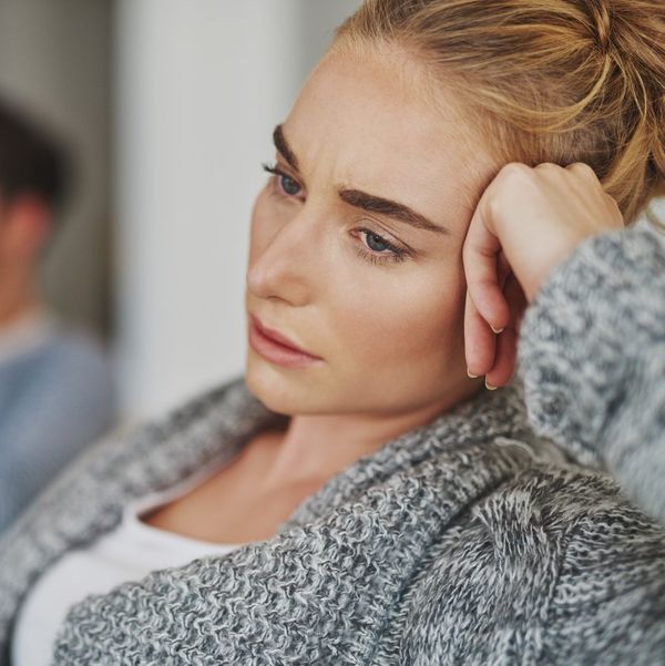 unhappy young couple after a fight at home