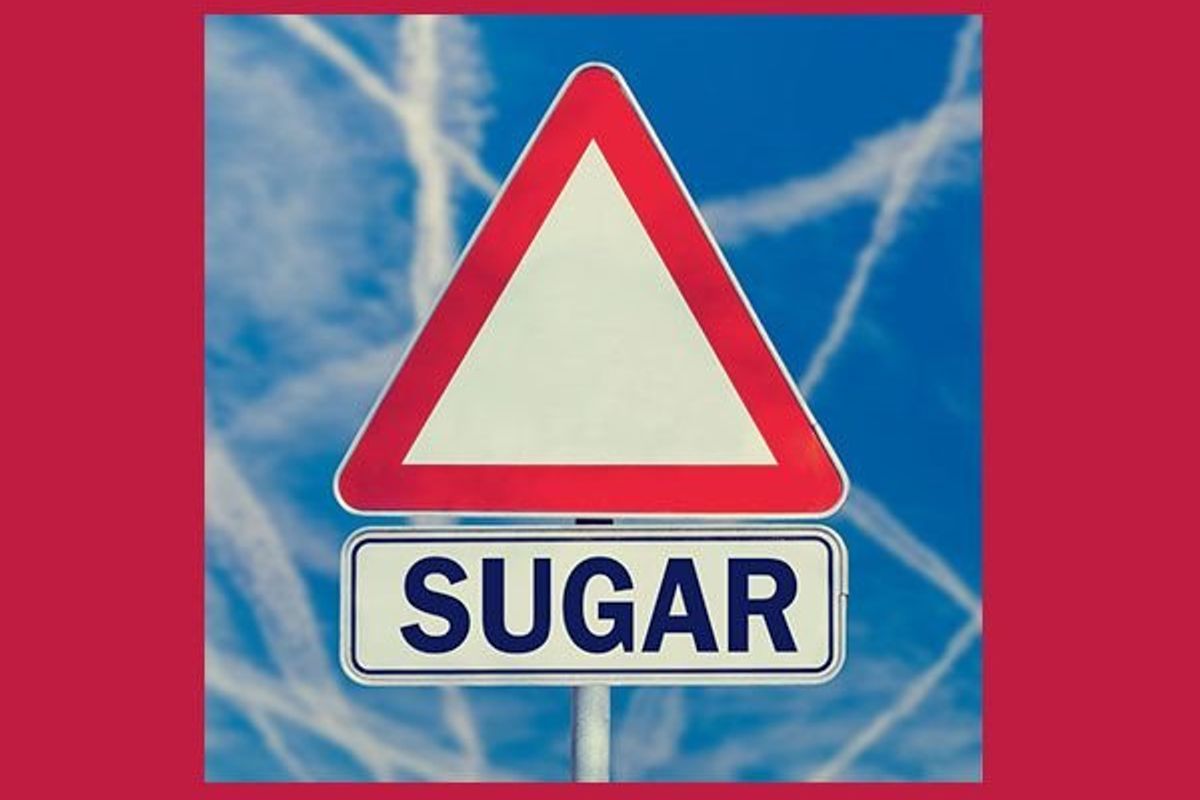 warning sign with the word sugar below it