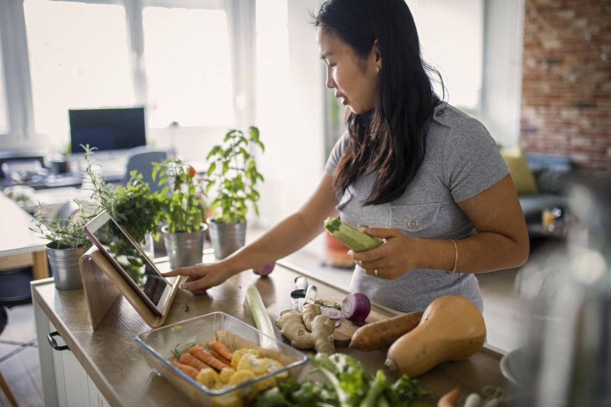 woman cooking healthy