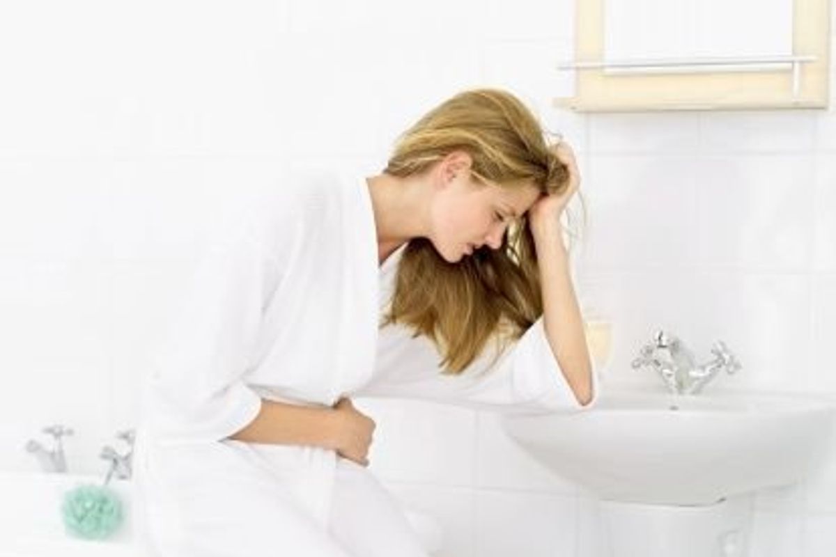 woman coping with pregnancy nausea