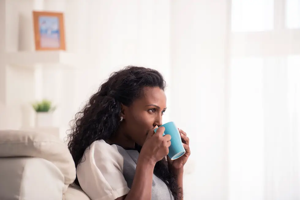 woman drinking coffee