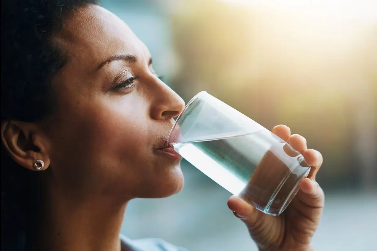 woman drinking hydrogen water