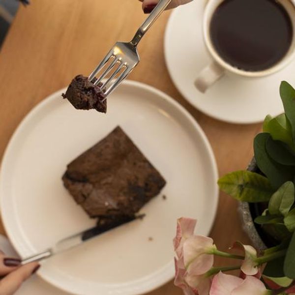 woman eating a brownie