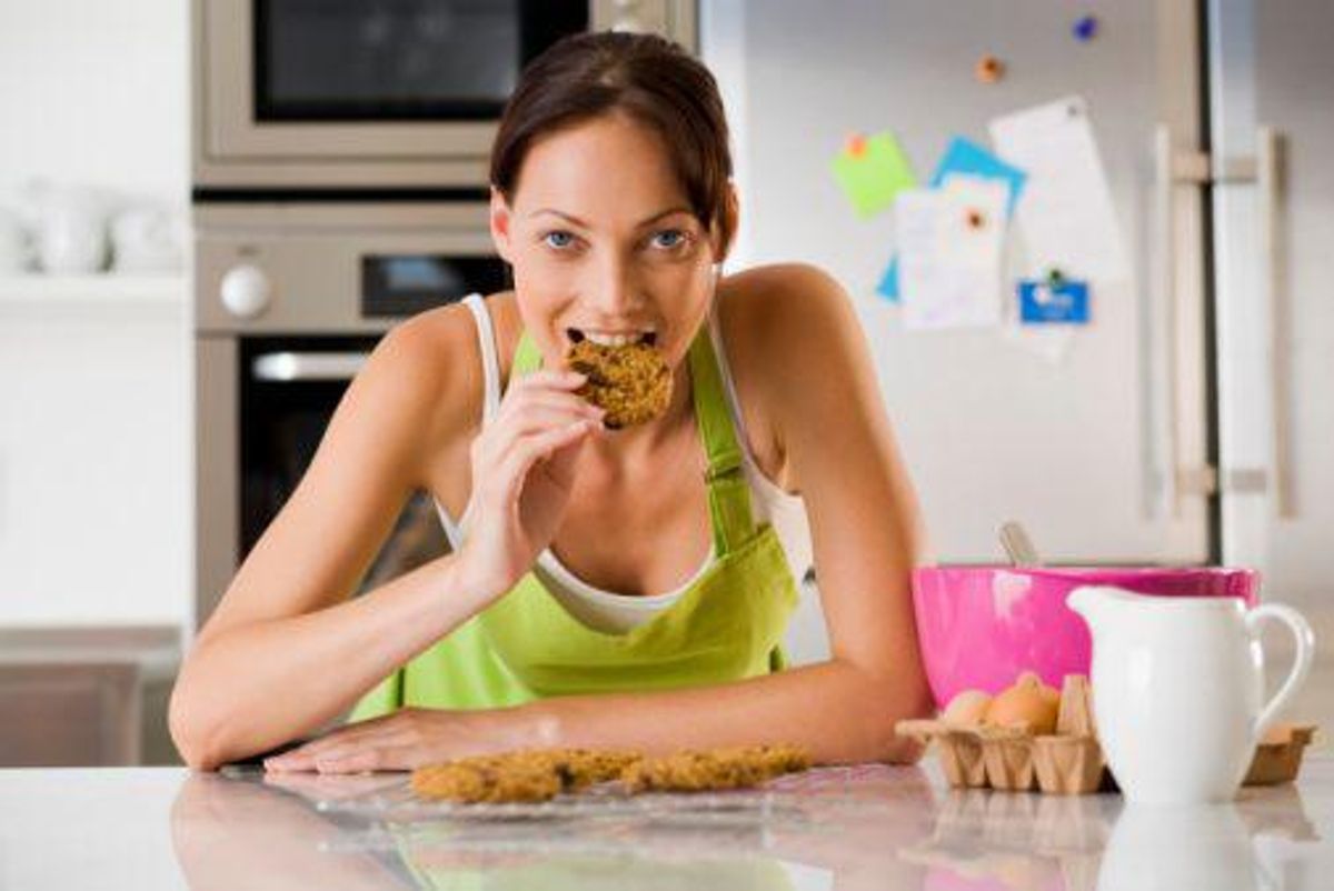 woman eating a cookie