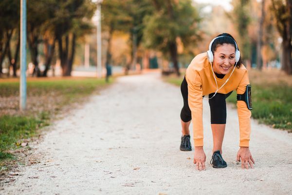 Woman exercising in public park