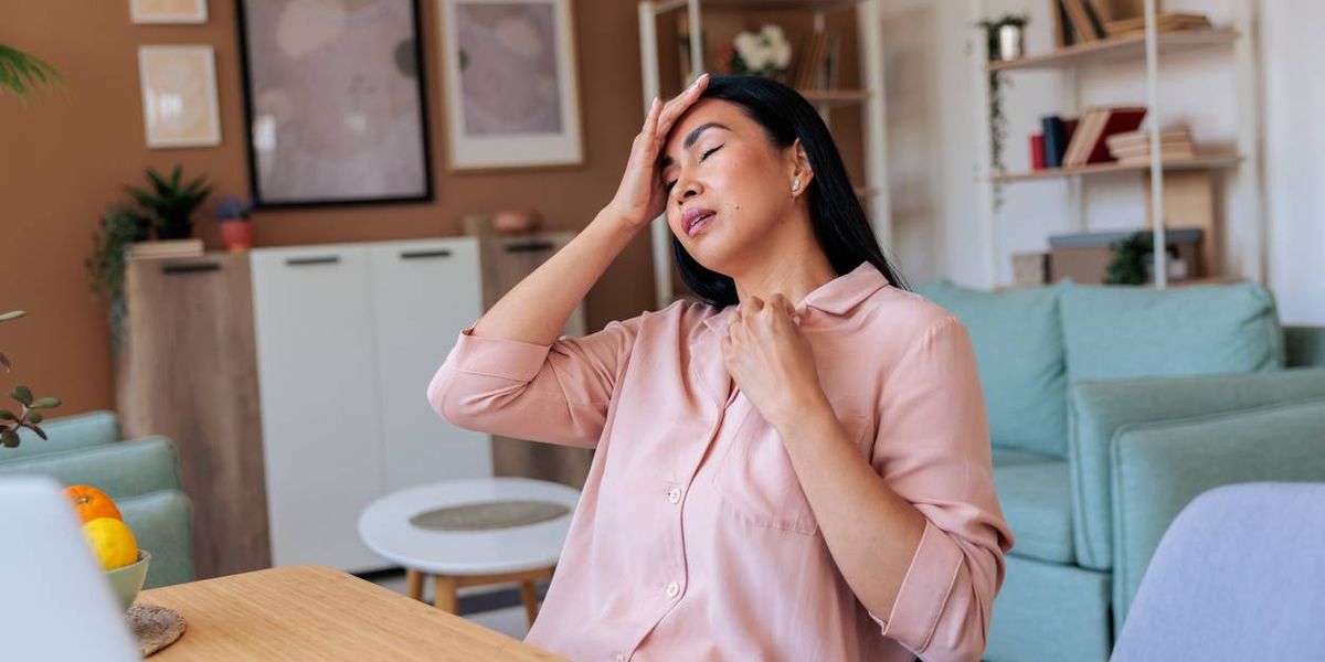 Woman Experiencing Hot Flash