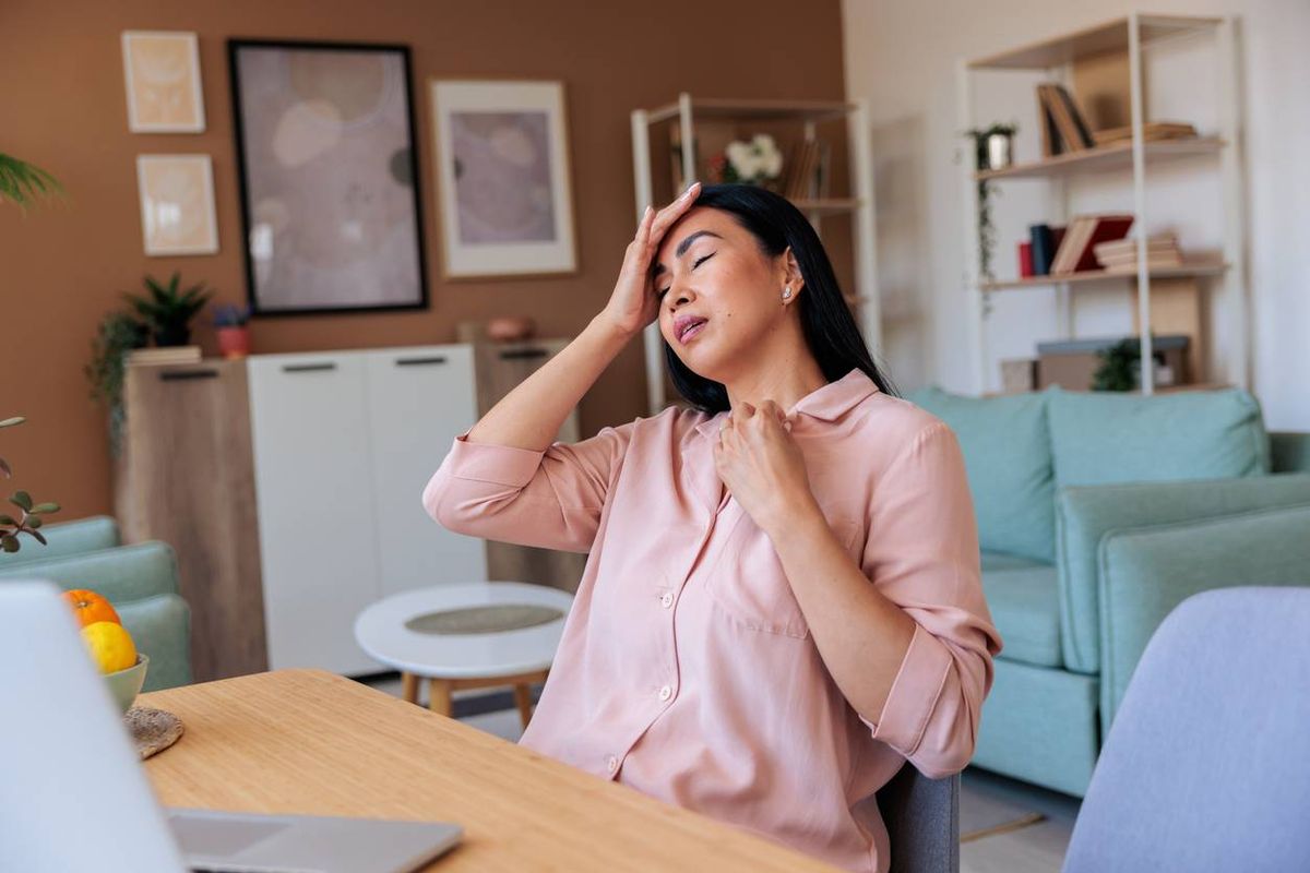 Woman Experiencing Hot Flash