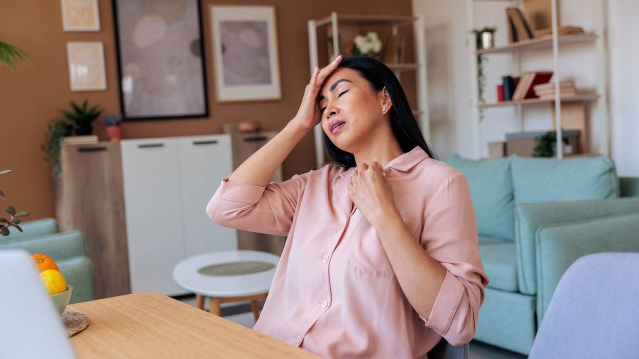 Woman Experiencing Hot Flash