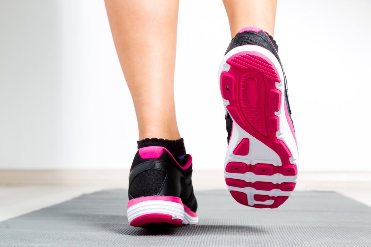 woman feet walking indoors
