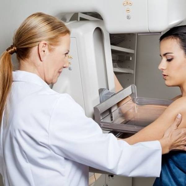 woman getting a mammogram