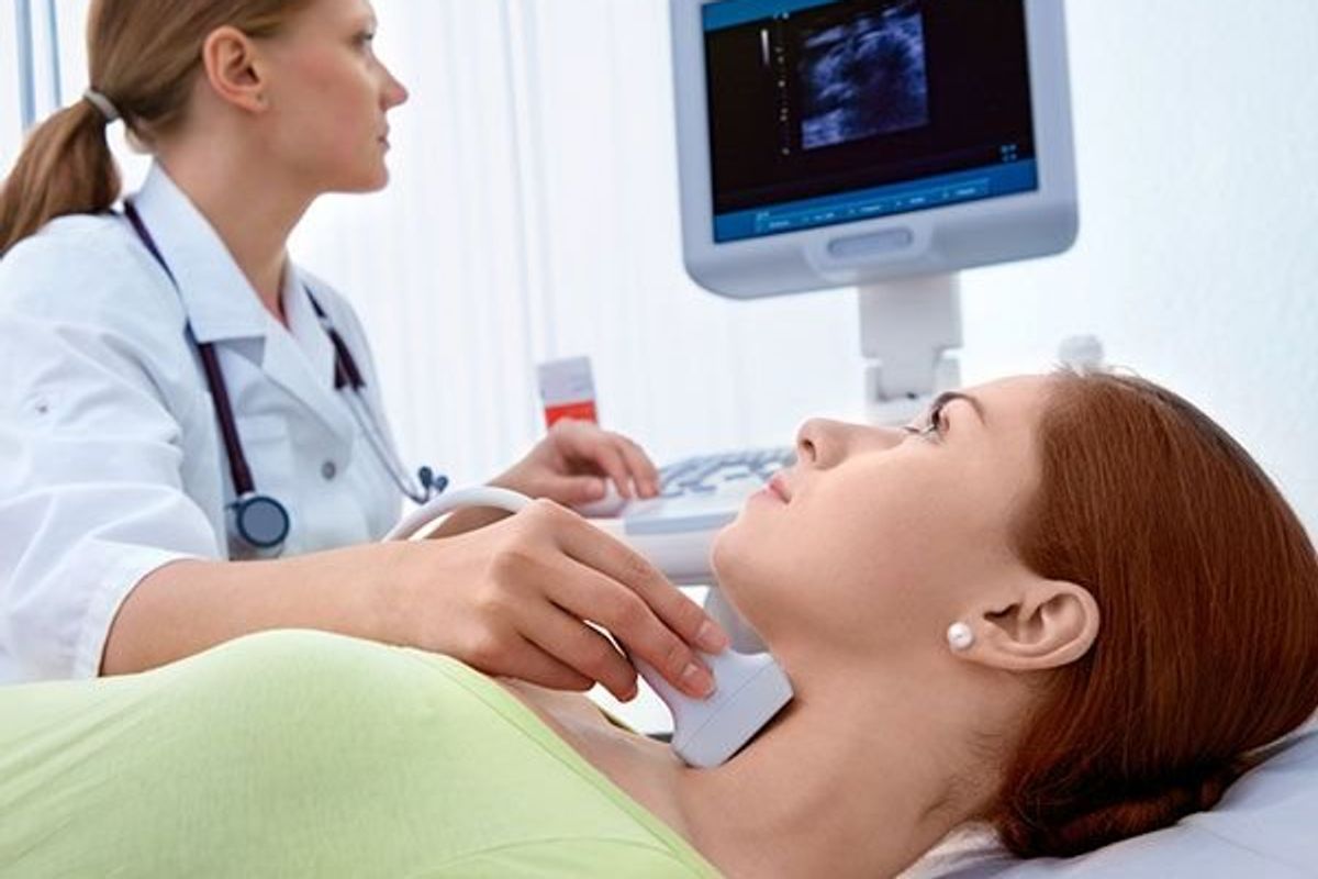 woman getting an ultrasound on her neck