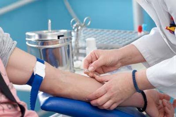 woman getting her blood drawn