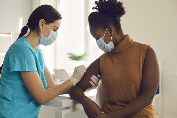woman getting seasonal influenza shot