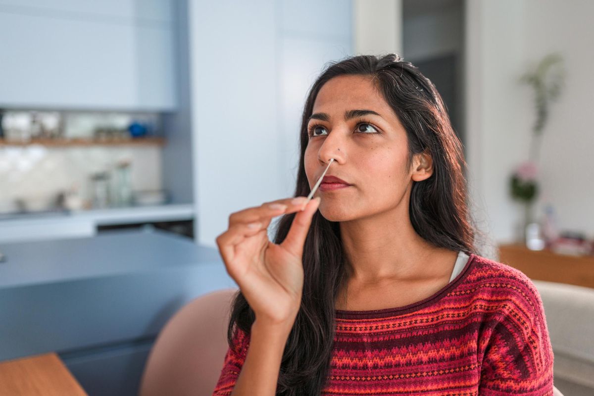 Woman Getting Taking A Covid Self Test