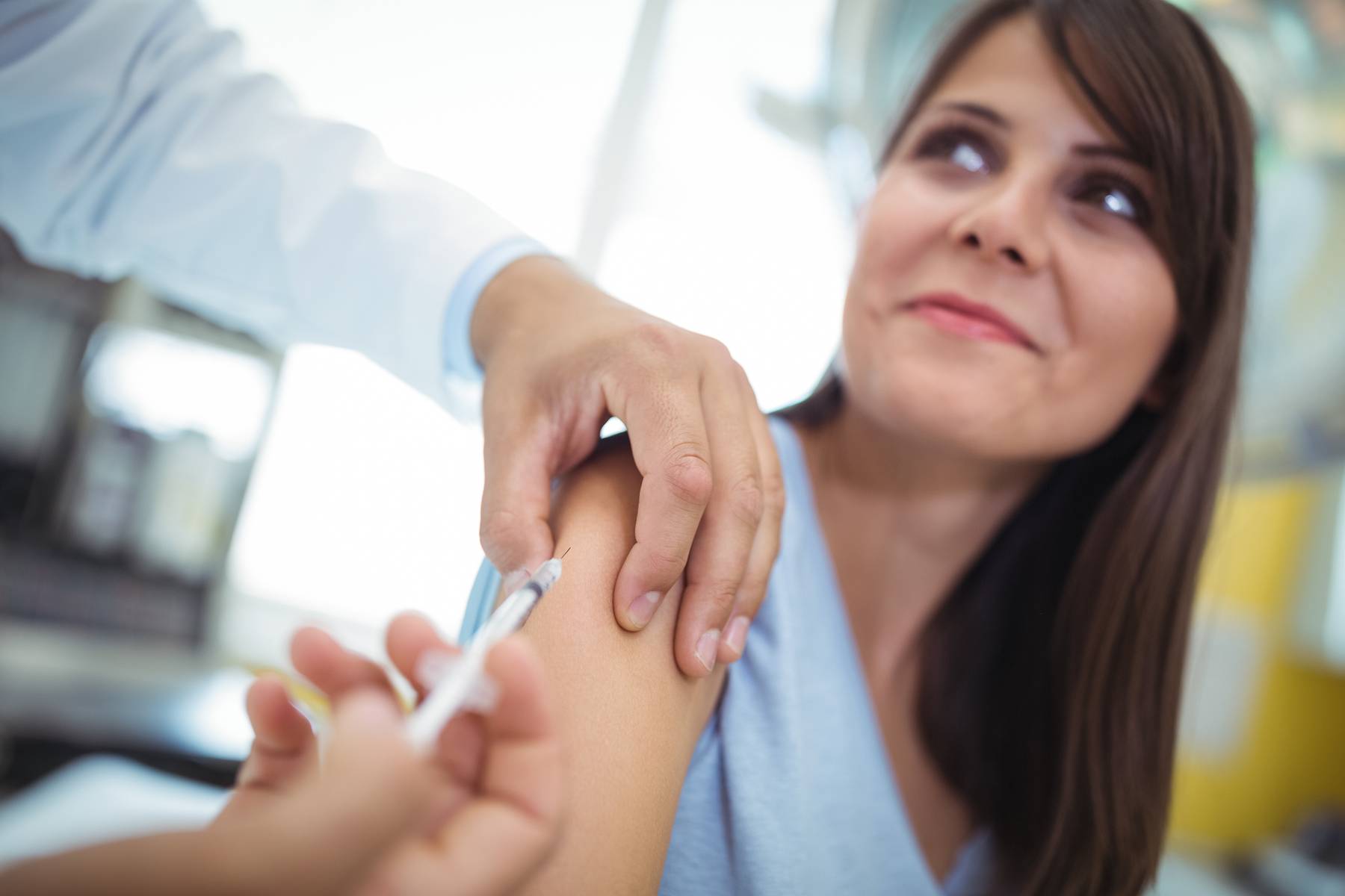 woman getting the flu shot