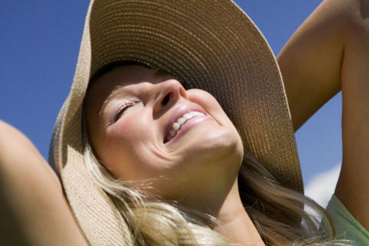 woman getting vitamin D from the sun