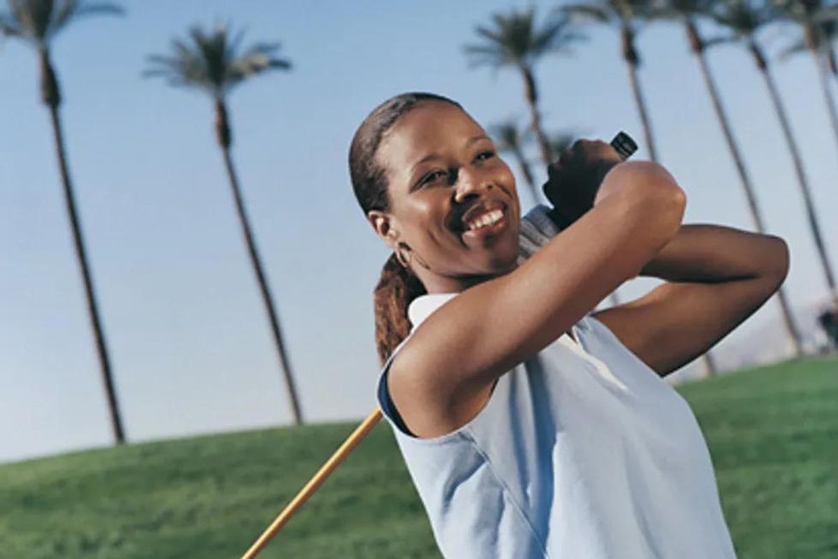 woman golfing