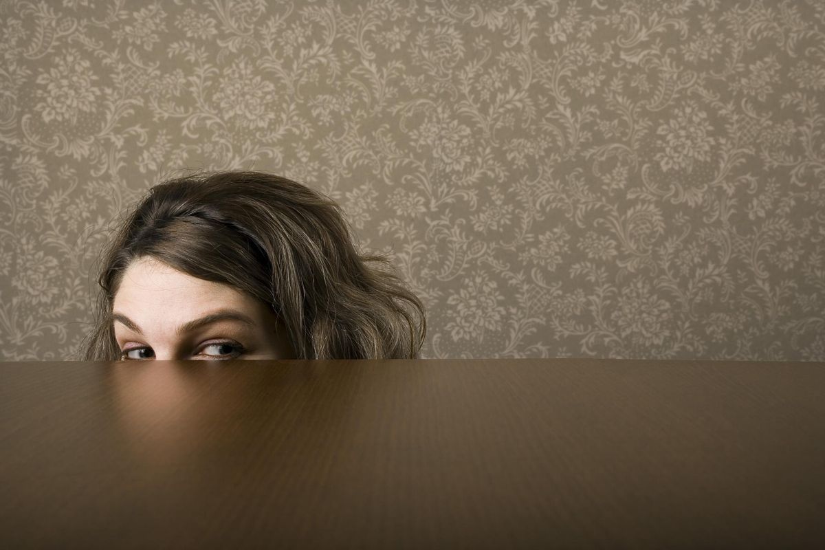 woman hiding most of her face