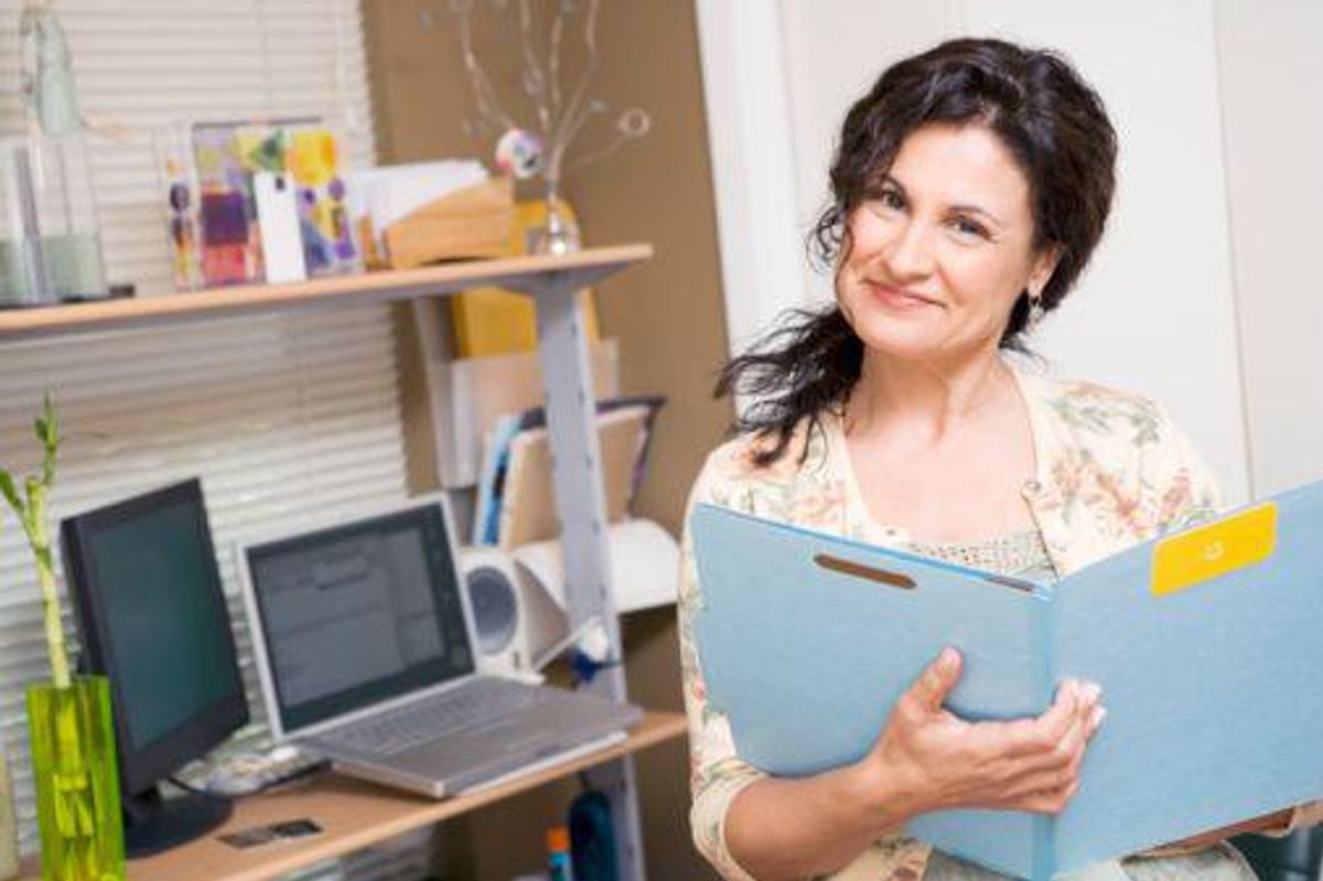 woman holding a folder