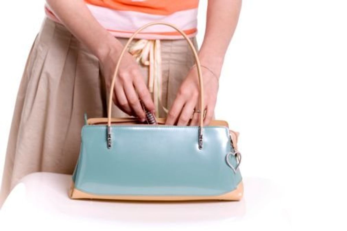 woman holding a purse